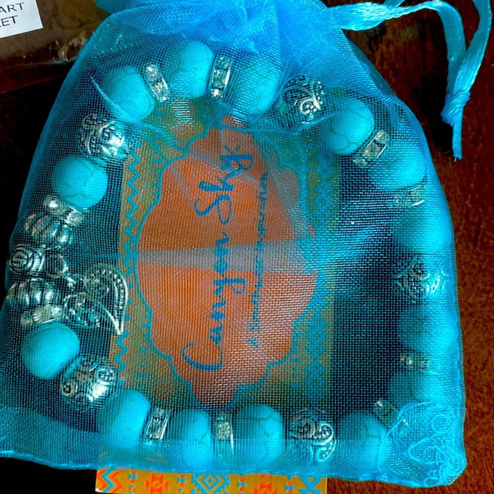 turquoise and silver bracelet with a heart charm